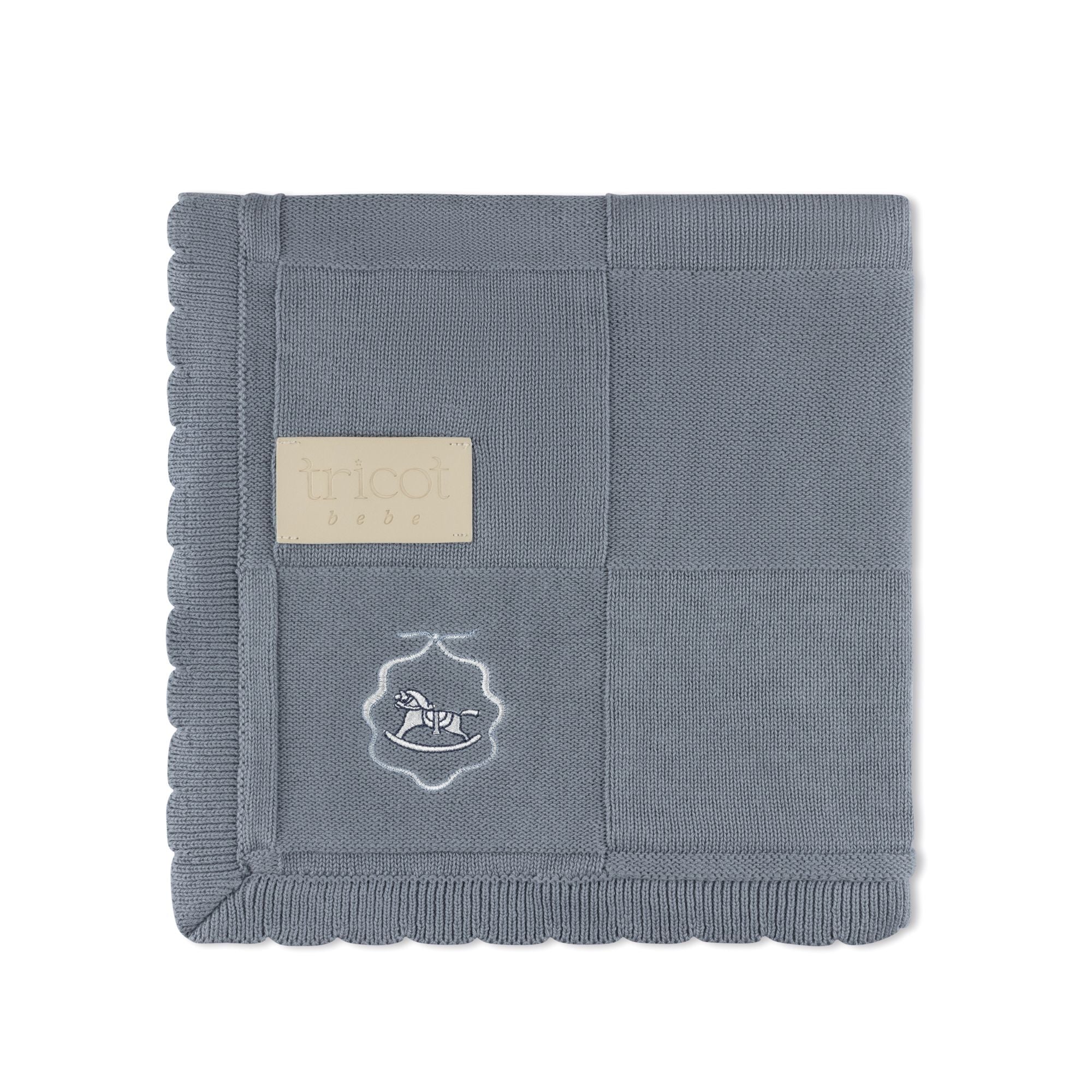 Blue embroidered knit baby blanket with crest detail by Tricot Bebe