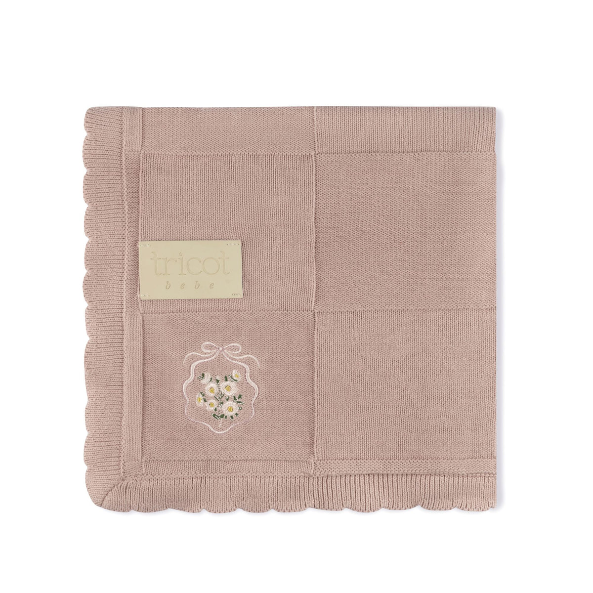 Pink embroidered knit baby blanket with crest detail by Tricot Bebe